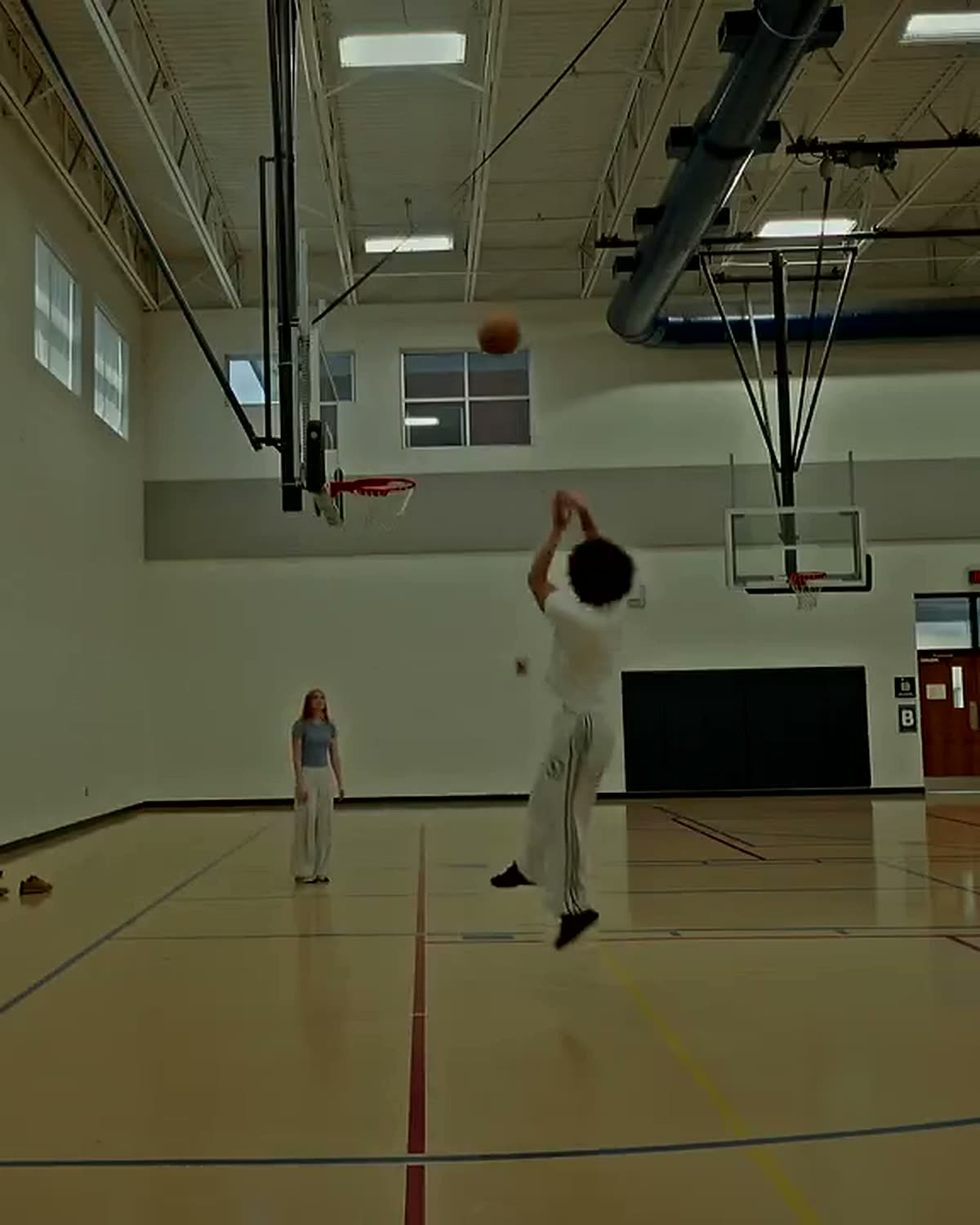 AI Shot Lab tracking a jumpshot on a dark court